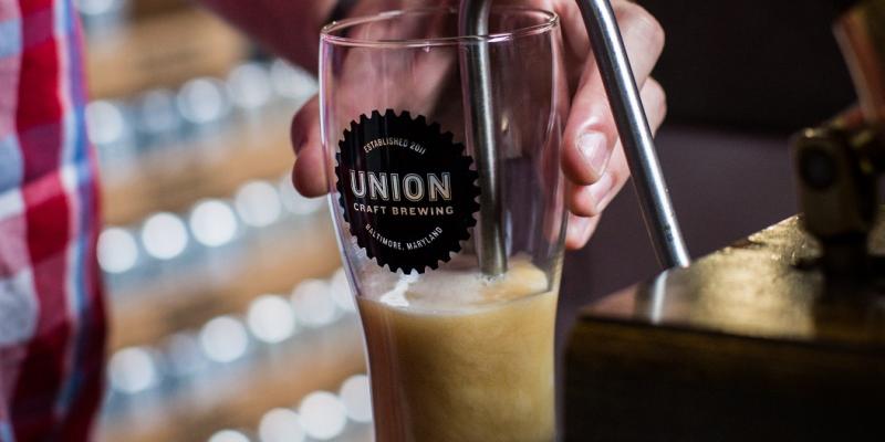A stout being poured Union Craft Brewing in Baltimore, Maryland, USA