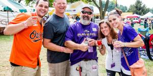 Festival goers toast for the camera