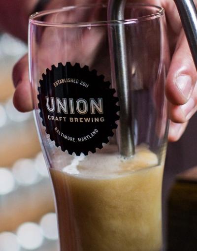 A stout being poured Union Craft Brewing in Baltimore, Maryland, USA